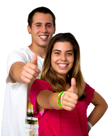 teen couple isolated on whiteの写真素材