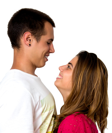 teen couple isolated on whiteの写真素材