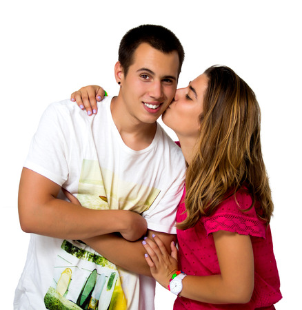 teen couple isolated on whiteの写真素材