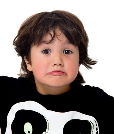 portrait of an expressive child isolated on whiteの写真素材