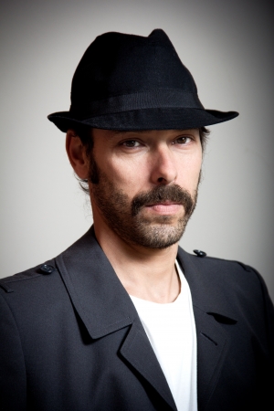 portrait of a middle aged man with gangster lookの写真素材