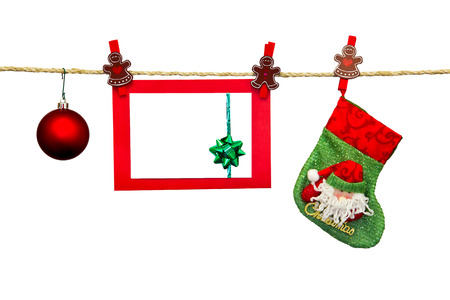 christmas card in clothesline isolated on whiteの写真素材