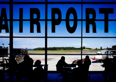 silhouettes in an airport terminalの写真素材