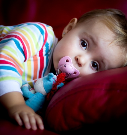 portrait of a baby in pajamasの写真素材