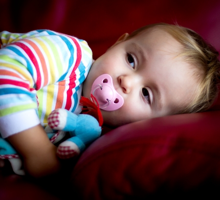 portrait of a baby in pajamasの写真素材