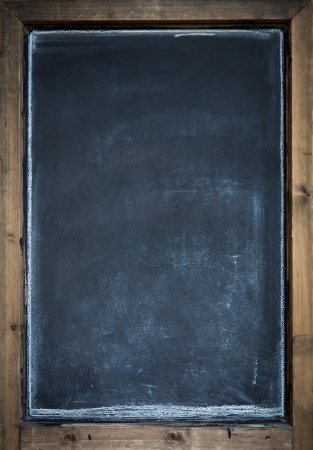 close up of a black dirty chalkboardの写真素材