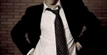 man in suit without head