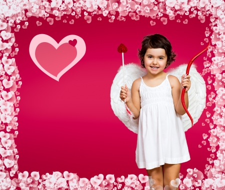 cupid little girl with a bow, arrow and wingsの写真素材