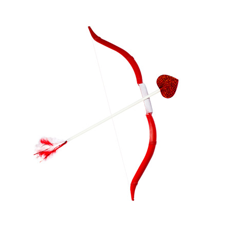 cupidÂ´s bow and arrow isolated on whiteの写真素材