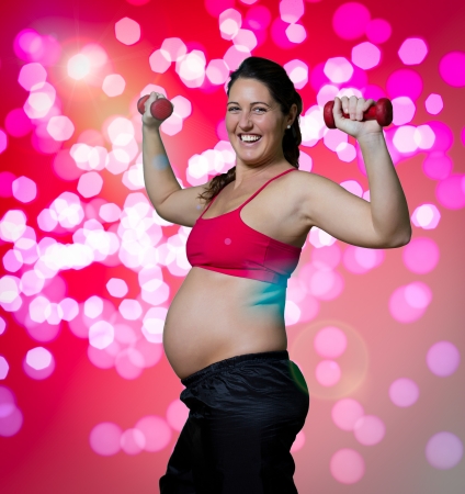 happy pregnant woman doing exerciseの写真素材