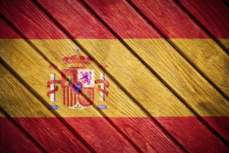 Spanish flag painted on old woodの写真素材