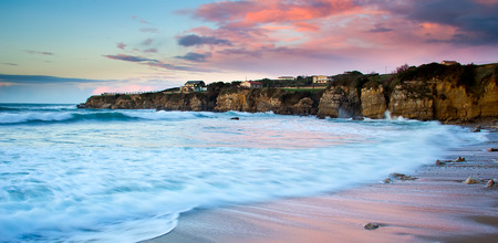 View of a rocky coast in the sunsetの写真素材