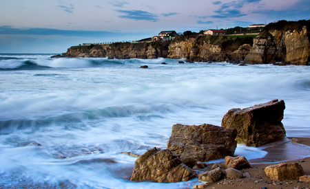 View of a rocky coast in the sunsetの写真素材