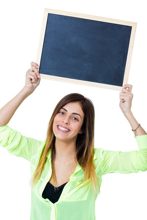 woman with chalkboard isolated on whiteの写真素材