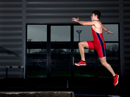 long jump athlete indoor trainingの写真素材