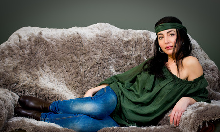 sexy woman lying on a couchの写真素材