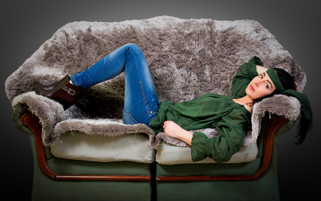 sexy woman lying on a couchの写真素材