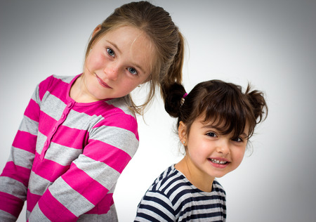 Portrait of two little girlsの写真素材
