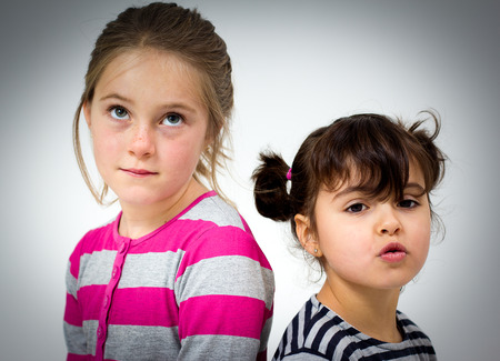 Portrait of two little girlsの写真素材