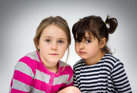 Portrait of two little girlsの写真素材