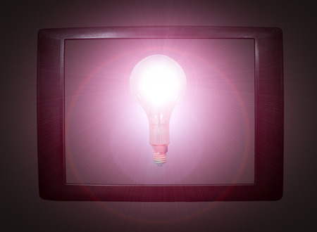 Light bulb in a tv frameworkの写真素材