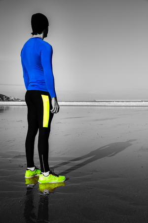 Young athlete training  on the beachの写真素材