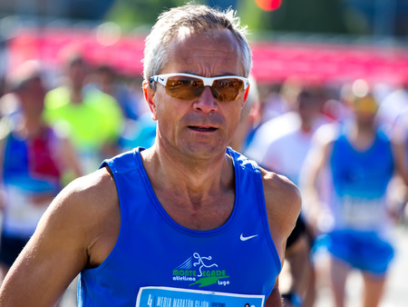 GIJON, SPAIN - MAY 2014: Participants in the annual half marathon in the city of Gijon, Spain, on Saturday, May 3, 2014.のeditorial素材