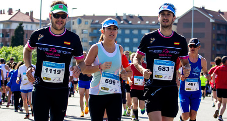 GIJON, SPAIN - MAY 2014: Participants in the annual half marathon in the city of Gijon, Spain, on Saturday, May 3, 2014.のeditorial素材