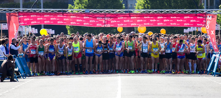 GIJON, SPAIN - MAY 2014: Participants in the annual half marathon in the city of Gijon, Spain, on Saturday, May 3, 2014.のeditorial素材