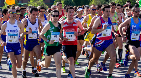 GIJON, SPAIN - MAY 2014: Participants in the annual half marathon in the city of Gijon, Spain, on Saturday, May 3, 2014.のeditorial素材