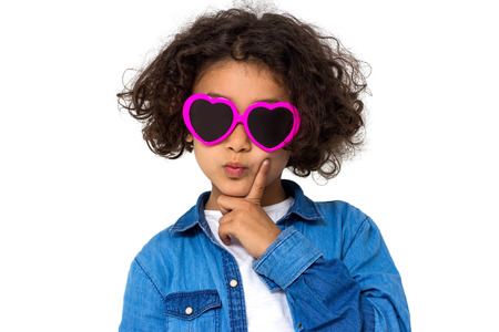 Portrait of a little girl isolated on whiteの写真素材