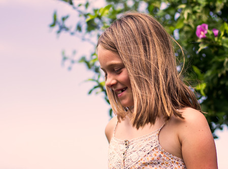 Portrait of a little girl in summer timeの写真素材