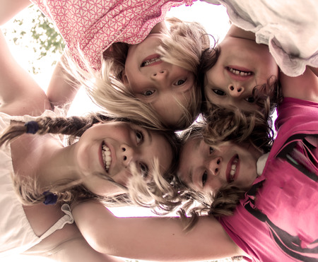 Four happy girls in summerの写真素材