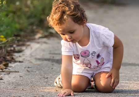 Portrait of a little girl in the countrysideの写真素材