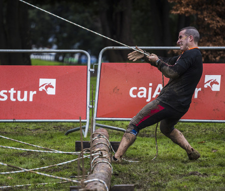 GIJON, SPAIN Jan 18 2015:  Participants in the  Farinato Race   held in the spanish city of Gijon,...