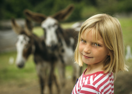 Portrait of a blonde little girlの写真素材