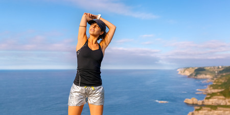 Pretty fitness woman training outdoors