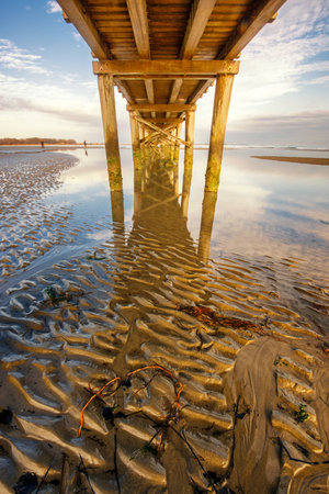 wooden pier from the foreshoreの写真素材