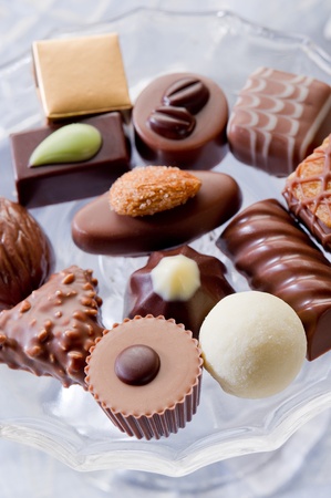 chocolate candy over crystal bowlの写真素材