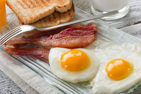 eggs with bacon for breakfastの写真素材