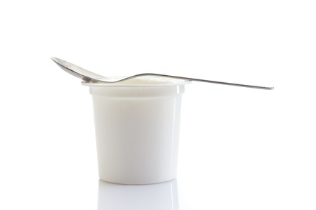 yogourt with spoonの写真素材