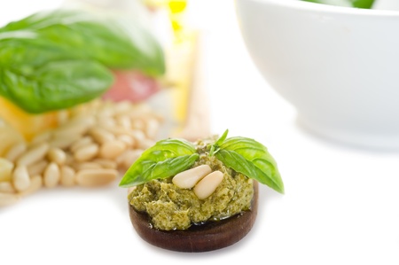 pesto sauce with ingredients on white backgroundの写真素材