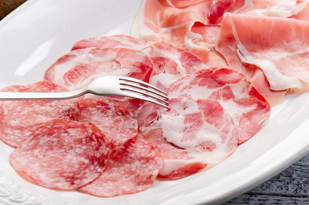 variety of salami and hamの写真素材