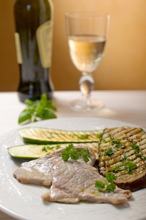 escalope with grilled vegetablesの写真素材