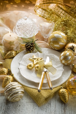 gold xmas table with decorationsの写真素材