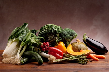 mix vegetables over wood backgroundの写真素材