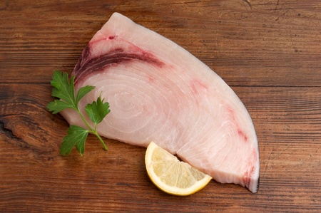 slice swordfish with ingredients ready to cookingの写真素材