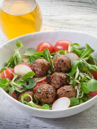 mixed salad with vegetarian meatballs slice radish and  soy sprout の写真素材