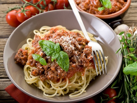 spaghetti bolognese with ragout sauce and parmesan cheeseの写真素材