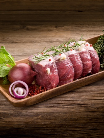 roast beef with ingredients ready to cookingの写真素材